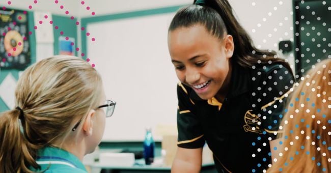 A student and a teenager look at careers ideas together