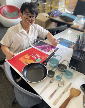 Year 6 student presenting why they might enjoy being a cook at a careers day